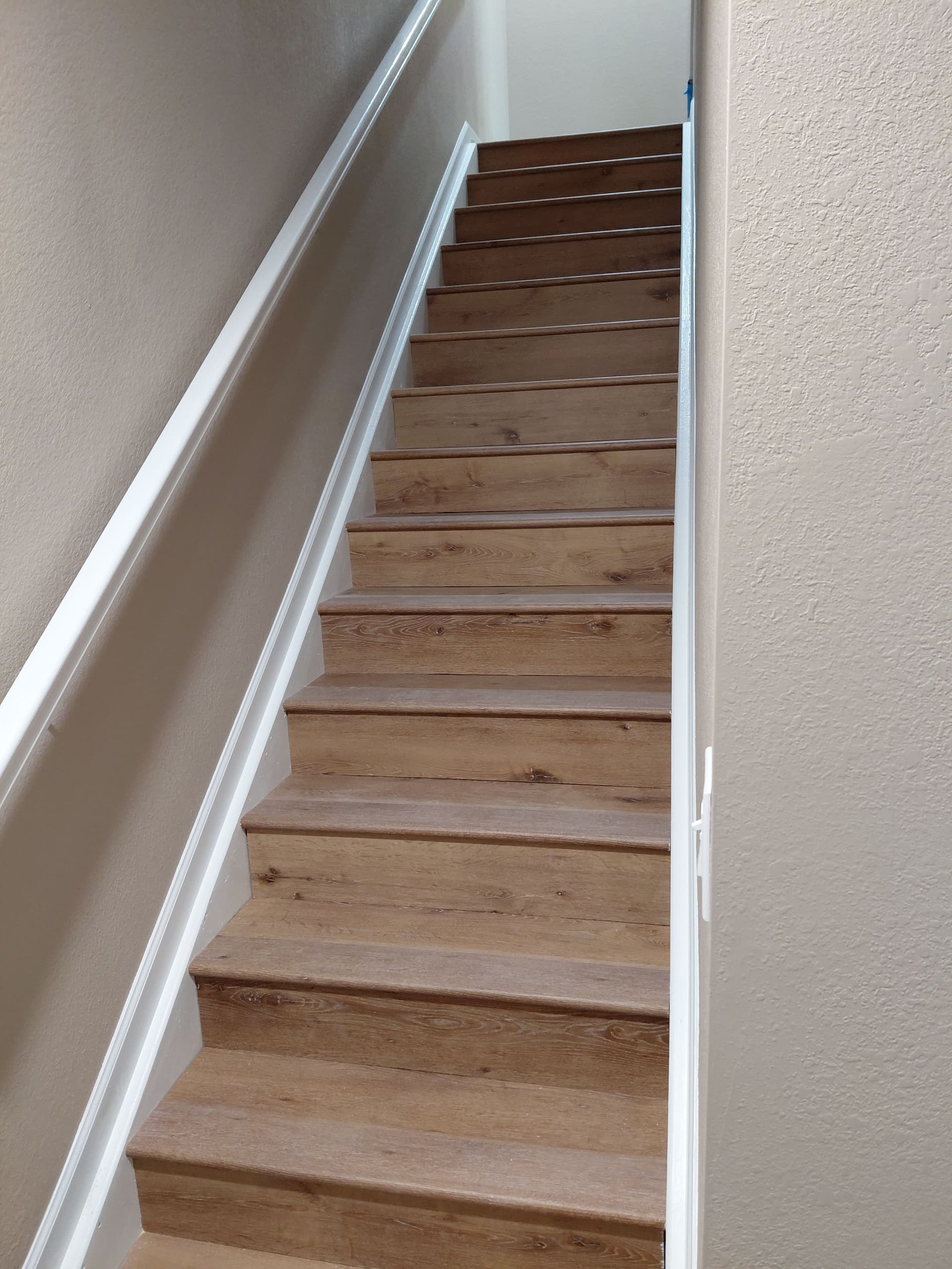 Gallery photos for Beautiful Basement Makeover with New Flooring and Stylish Trim: Image #2