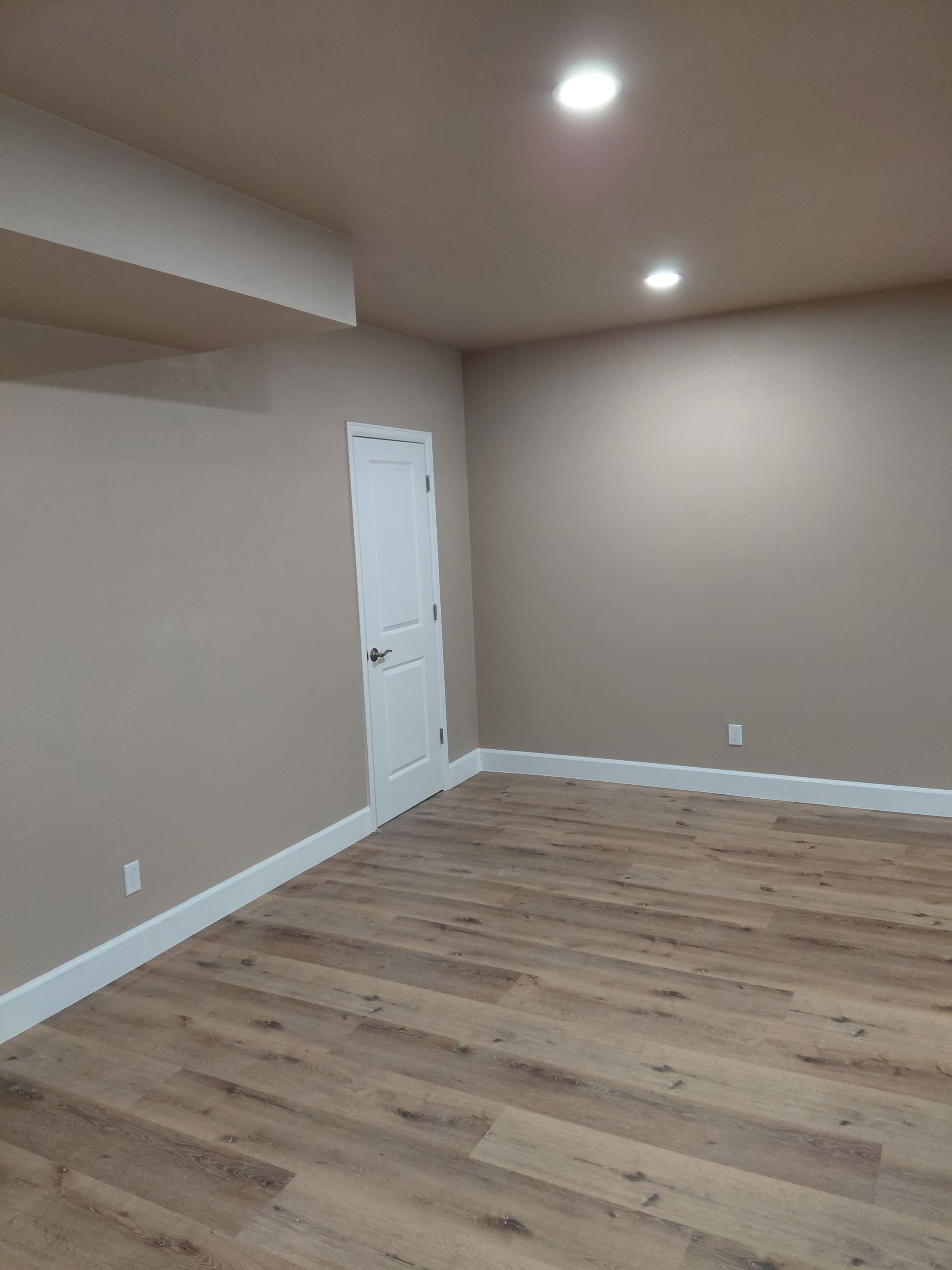Gallery photos for Beautiful Basement Makeover with New Flooring and Stylish Trim: Image #1
