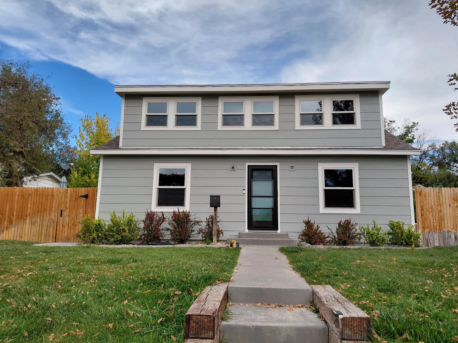 Fresh Paint, Clean Trim, and New Windows That Tie It All Together image