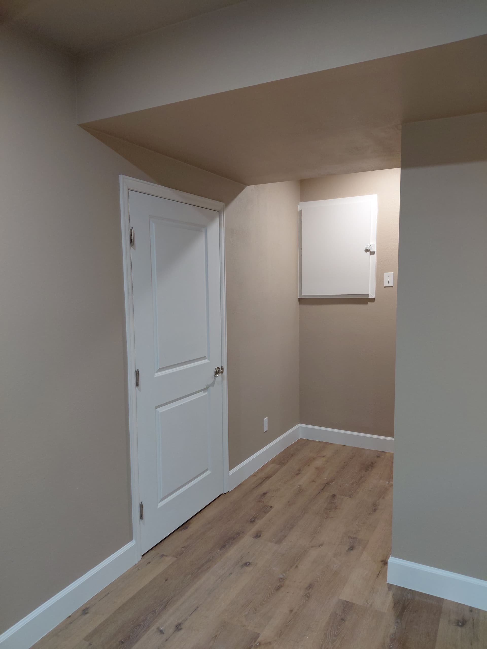 Gallery photos for Beautiful Basement Makeover with New Flooring and Stylish Trim: Image #3