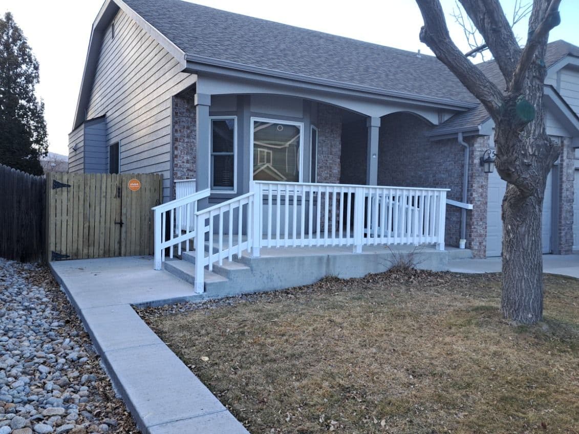 Gallery photos for Porch Makeover with Stylish White Railing: Image #1