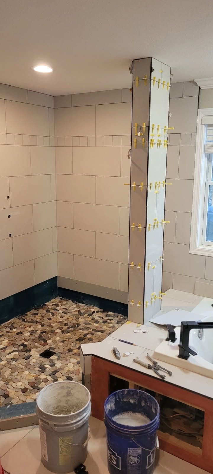 Gallery photos for Bathroom Remodel Featuring Stone Pebble Floor: Image #1